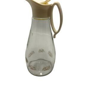 Log Cabin Syrup bottle